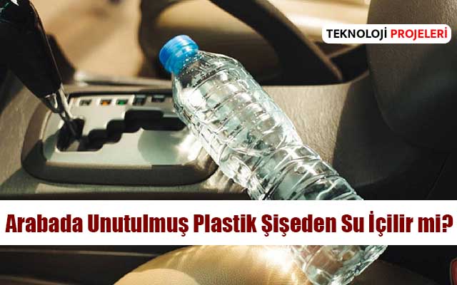 Araba koltuğunda unutulmuş plastik su şişesi, sıcak bir günde güneş ışığına maruz kalmış durumda